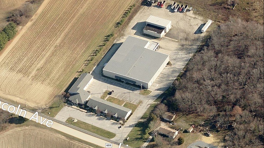 Secure trailer drop yard with multiple parked trailers